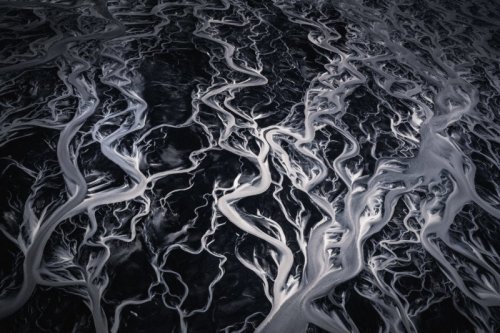 Swirling glacial rivers - Iceland - Copyright 2018 Albert Dros